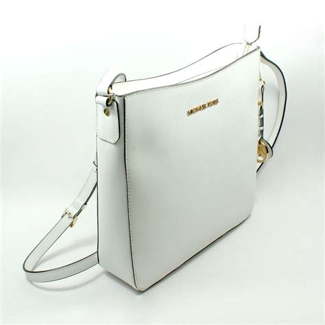 michael kors white monogram crossbody|Michael Kors leather crossbody bag.